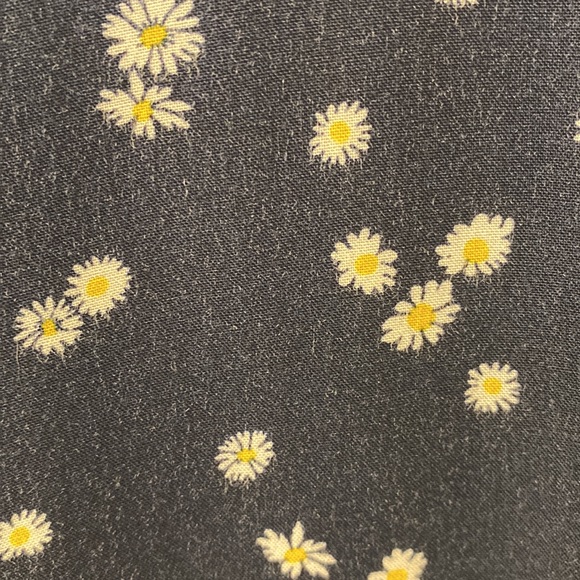 It’s a flowery navy shirt from the beachlunchlounge collection it’s medium. - Picture 2 of 3